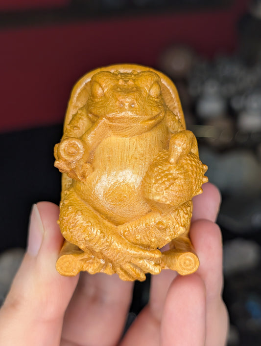 Wooden Toad in a Rocking Chair Carving
